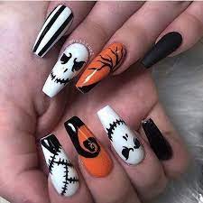 Easy spider halloween nails at home2. Halloween Nails Black White And Orange With Skeleton Skulls Halloween Nails Easy Cute Halloween Nails Halloween Acrylic Nails