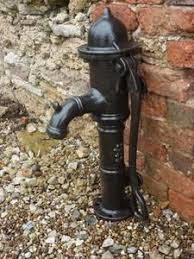 A stunning antique cast iron, brass and copper hand pump professionally restored and in full working order. Restored Antique Cast Iron Water Hand Pump By Lion Victorian Salvaged Hand Water Pump Old Water Pumps Iron Water
