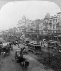 1901 Canal St The Main Thoroughfare Of New Orleans Original Maison Blanche Building Is The Light Colored Bu New Orleans History New Orleans Louisiana History
