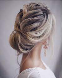 Beautiful Loose Plait Into A Bun Another Good Wedding Guest Hairstyle Long Hair Styles Hair Styles Wedding Hairstyles For Long Hair