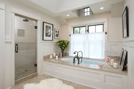 The idea behind these large oversized white tiles is making the space appear roomier than it is. Appealing Bath Mats And Rugs That Enhance The Look Of Your Bathroom