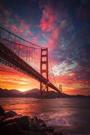 Times for san francisco, ca Lit Fiery Sunset At The Golden Gate Bridge In San Francisco Golden Gate Bridge Photography San Francisco Golden Gate Bridge Golden Gate Bridge