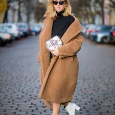 Wearing layered camel head to toe is actually an incredibly quick way of pulling together a chic look that feels on trend and gets you from a meeting a key purchase is a great camel coat. 12 Trendy Ways To Wear White Boots Now