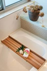 Simply add your select items onto the bath caddy tray and place it on the edges of the bathtub. 27 Bath Caddy Ideas Bath Caddy Bath Bath Rack