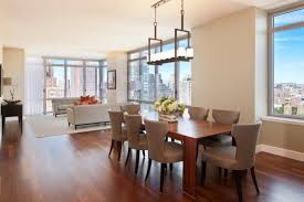 When deciding how high the fixture should be, the rule of thumb is for the bottom of the fixture to be about 30 to 36 inches above the surface of your table. 10 Beautiful Dining Rooms With Hanging Lights