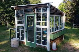 Using a wood frame that's been filled with hundreds of glass jars, you can build a functional and surprisingly pretty greenhouse. 15 Fabulous Greenhouses Made From Old Windows Off Grid World