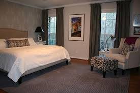 It is a warm and soft neutral gray. Gray Drapes Transitional Bedroom Benjamin Moore Balboa Mist