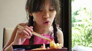 4k : Asian Girl Eating Japanese Food Sushi Stock Footage SBV