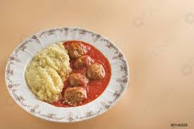 Moroccan couscous, origins, style and history, how to make traditional, vegetable salad, lamb the couscous is not just moroccan, but one of the emblematic dishes of the maghreb countries. Fleischballchen Mit Typisch Marokkanischem Couscous Foto Vorratig Crushpixel
