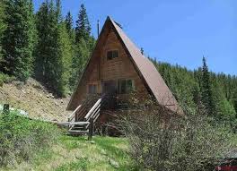 15 Off The Grid Homes For Sale Right Now Off Grid House A Frame House Off Grid Cabin