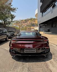 Image result for Divine Red 2023 Aston Martin