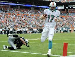 Miami Dolphins Quarterback Ryan Tannehill Scores A Touchdown Week 2 2012 Season Dolphins Football Dolphins Miami Dolphins Quarterback