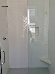 3x6 White Subway Tile Set In Herringbone Pattern Gray Penny Rounds On Floor White Tile Shower Herringbone Backsplash White Subway Tile Bathroom