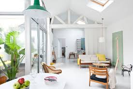 In Her Lofty Home In Bordeaux Designer Caroline Gomez Paints Blocks Of Potent Pastels As A Space Defining Technique Affordable Interior Design Home
