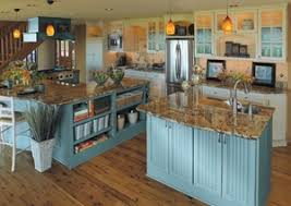 Turquoise blue retro appliances offset the dark cabinetry in this small kitchen seen on hgtv's kitchen cousins. Three Cozy Palates For Country Kitchens