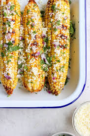 I would also recommend getting some wooden skewers or corn holders for serving. Grilled Mexican Street Corn Fit Foodie Finds