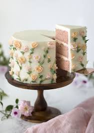 A Moist Strawberry Cake With A Kiss Of Lemon Covered In Delicate Buttercream Flowers Painted Cakes Amazing Cakes Pretty Cakes
