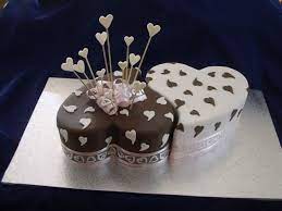 Name on birthday cake is an amazing app which lets you wish with beautiful birthday cake by writing your friends name in name on cake for engagement ceremony card frames on desired birthday. 2 Hearts Shaped Ying Yang Designer Engagement Ring Roka Ceremony Cake Thebakeshop Co In Best Treats In Town