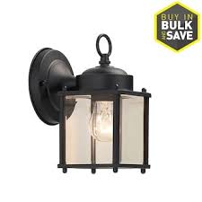 The current fixture has frosted glass so most of the light goes up (and we can't stand the fixture style, so it has to go). Portfolio 8 25 In H Black Medium Base E 26 Outdoor Wall Light Lowes Com Outdoor Ceiling Lights Exterior Light Fixtures Wall Lights
