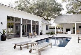Farmhouse Style Two Ways Modern Farmhouse Exterior Pool Houses Farmhouse Exterior