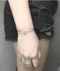 Pin By Rachel Upright On Tattoos Wrist Bracelet Tattoo Tattoo Bracelet Trendy Tattoos