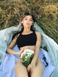 Irena Ortega on X: Want to feel grass under my body again . You can guess  it's forest but no - it's just grassy part near train station . We made all