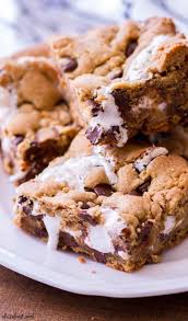 These Marshmallow Peanut Butter Chocolate Chip Cookie Bars Are Rich Gooey And Complete Peanut Butter Cookie Bars Cookie Bar Recipes Dessert Bars Recipes Easy