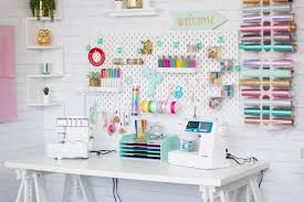 The island, built from sektion cabinets, works as a cutting table. Cute Functional Craft And Sewing Room Ideas Sweet Red Poppy