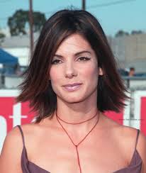 20 medium shaggy hairstyles ideas for women 2017. Sandra Bullock Youthful Medium Length Hairstyle With Highlights And A Flip At The Ends