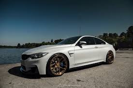 White Car Black And Bronze Wheels Bmw M4 White