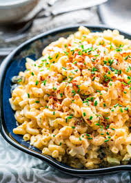 Add the green onions (reserving a handful for the garnish) and cheese and mix it in. Deviled Egg Macaroni Salad Jo Cooks