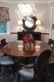 Transitional Dining Room With Round Table Transitional Dining Room Round Wooden Dining Table Buffet Decor
