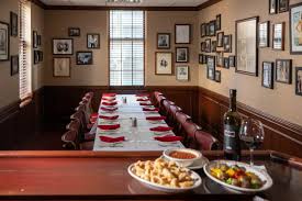 The adjoining bar & fireplace rooms also boast glass doors leading to a quaint balcony, providing guests with sweeping views of state street & bellevue place. Gene Georgetti Chicago Private Dining Gene And Georgetti