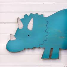 Get free shipping on qualified metal outdoor wall decor or buy online pick up in store today in the outdoors department. Decorating With Dinosaurs Handmade Charlotte