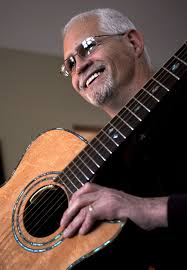 Father and son create handmade acoustic guitars