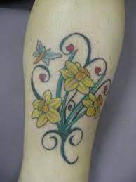 Daffodil Tattoos And Meanings Daffodil Tattoo Designs And Ideas Daffodil Tattoo Images Daffodil Tattoo Tattoo Designs Flower Tattoo Sleeve