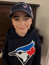 Wish Alum Logan loves the @bluejays and hopes to see them win it all! ⚾🧢  Logan was diagnosed with cancer when he was a kid and has since had an  implant in