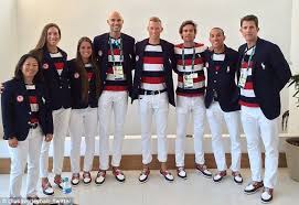The men wore blue suit jackets and khakis, while the women looked posh in red skirt suits. Barack Michelle Obama Urge On Team Usa Ahead Of Rio Opening Ceremony Barack And Michelle Rio Olympics Opening Ceremony Sport Outfits