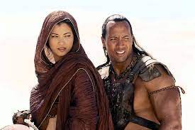 Since his triumphant rise to power in the original blockbuster the scorpion king, mathayus' kingdom has fallen and he's lost his queen to plague. Hd Wallpaper Movie The Scorpion King Dwayne Johnson Kelly Hu Wallpaper Flare