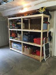 Diy Garage Storage Shelves Get The Free Plans At Buildsomething Com Diy Storage Shelves Garage Organization Shelves Laundry Room Storage