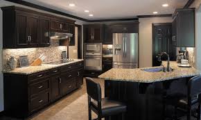 This kitchen cabinet design matches well with more light and bright kitchens, as the illusion of open space enhances the openness of larger, brighter blue provides a needed contrast for stark white kitchens and creates a slightly darker, more homey feel. Kitchen Ideas With Dark Brown Cabinets Modern Design From Kitchen Ideas With Black Appliances And Oak Cabinets Pictures