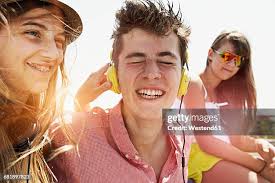 57.628 Friend Listening To Friend Stock Photos, High-Res Pictures, and  Images