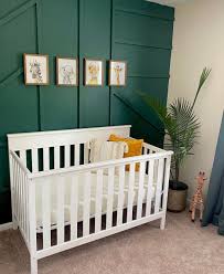 The black and white rug, with its dramatic striped pattern, helps to ground the bold green hue in this otherwise bright and airy space. Baby Boy Nursery Ideas Melbourne Girl Stuff
