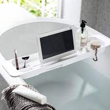 A perforated dish to hold soap or loofahs, a wine glass slot, and hooks for hanging a washcloth or razor. 10 Best Bathtub Trays To Buy In 2021 Best Bath Caddies
