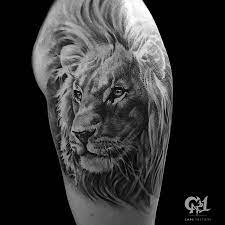 Black And Gray Realistic Lion Tattoo Shoulder Tattoo Tattoosbycapone Lion Tattoo Realistic Lion Tattoo Watercolor Lion Tattoo