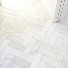 Tile, vinyl, hardwood, laminate, carpet, outdoor, mosaic, subway Satin White Bathroom Floor Tile In A Herringbone Design Royal Satin White Marbl Kitchen Floor Tile Patterns Modern Kitchen Tile Floor Modern Kitchen Flooring