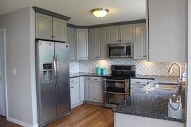 Maybe you would like to learn more about one of these? Gray Cabinet And Blue Pearl Granite Grey Countertops Blue Countertops Grey Cabinets