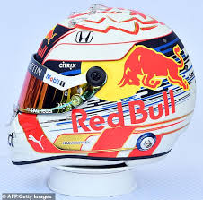 Replica helmet including max verstappen's logo and number plus red bull, jumbo and partner logos; Lewis Hamilton Jesus Helmet
