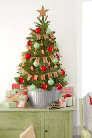 Upgrade Your Christmas Tree Game With These Decorating Ideas Small Christmas Trees Decorated Mini Christmas Tree Decorations Cool Christmas Trees