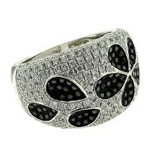 Jewelry is an item of everyday life that has a larger significance than many people realize. 2 Carat Diamond Black Diamond Flower Petals Wide Band Ring White Gold Brilliance Jewels Fine Jewelry And Luxury Watches Miami